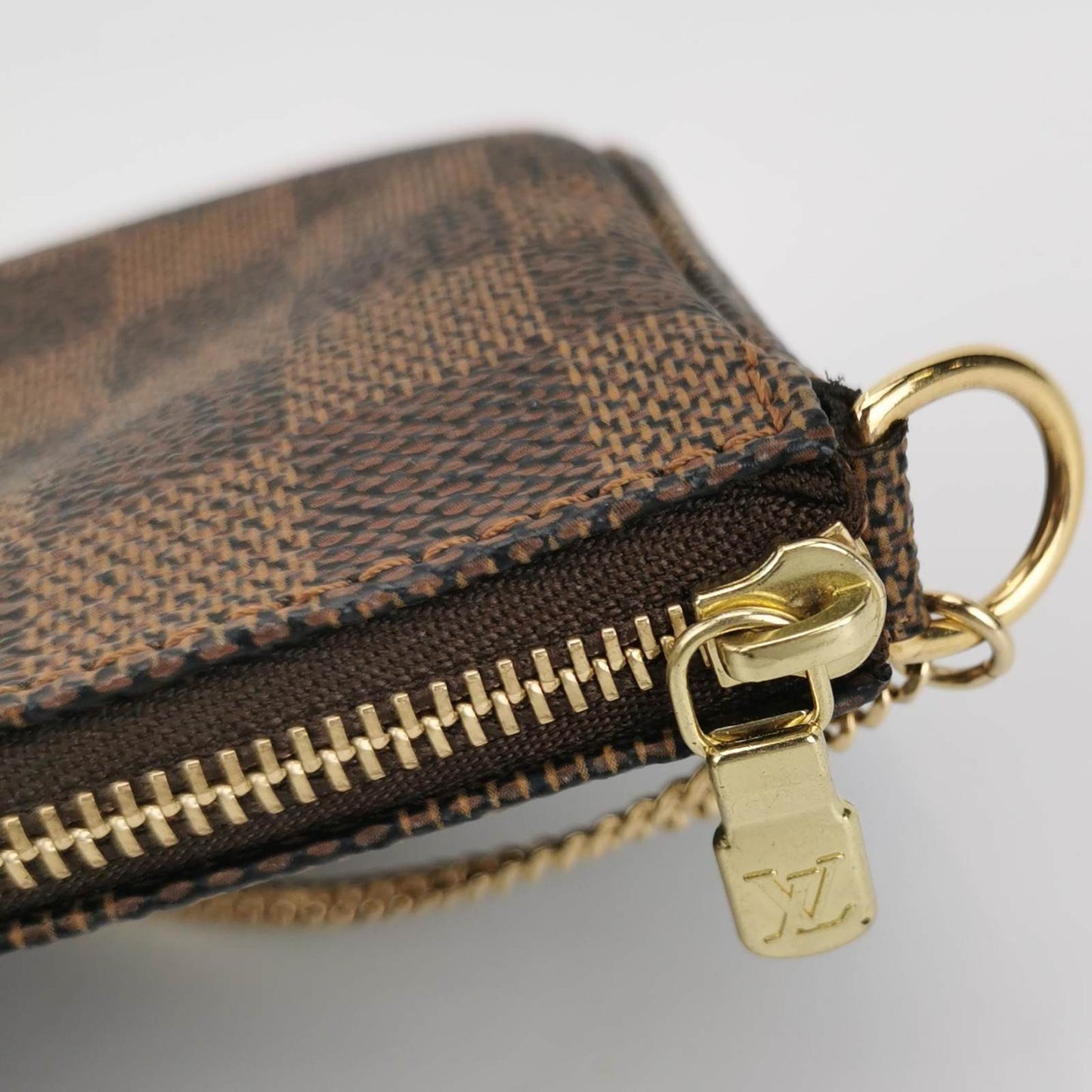 LOUIS VUITTON DAMIER EBENE CANVAS MINI POCHETTE ACCESSOIRES